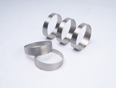 Titanium 3 inch pie-cut segments arranged as a 45 degree bend