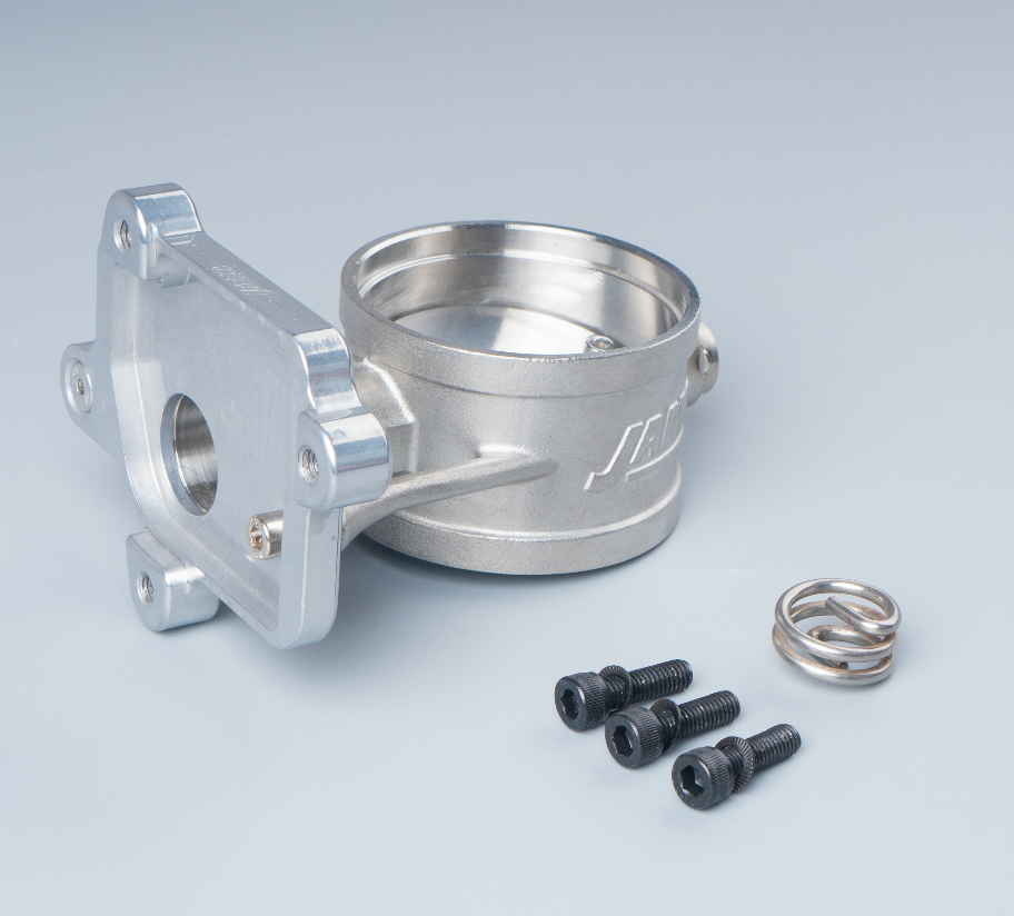 BMW valve assembly with CNC-machined billet actuator mounting bracket