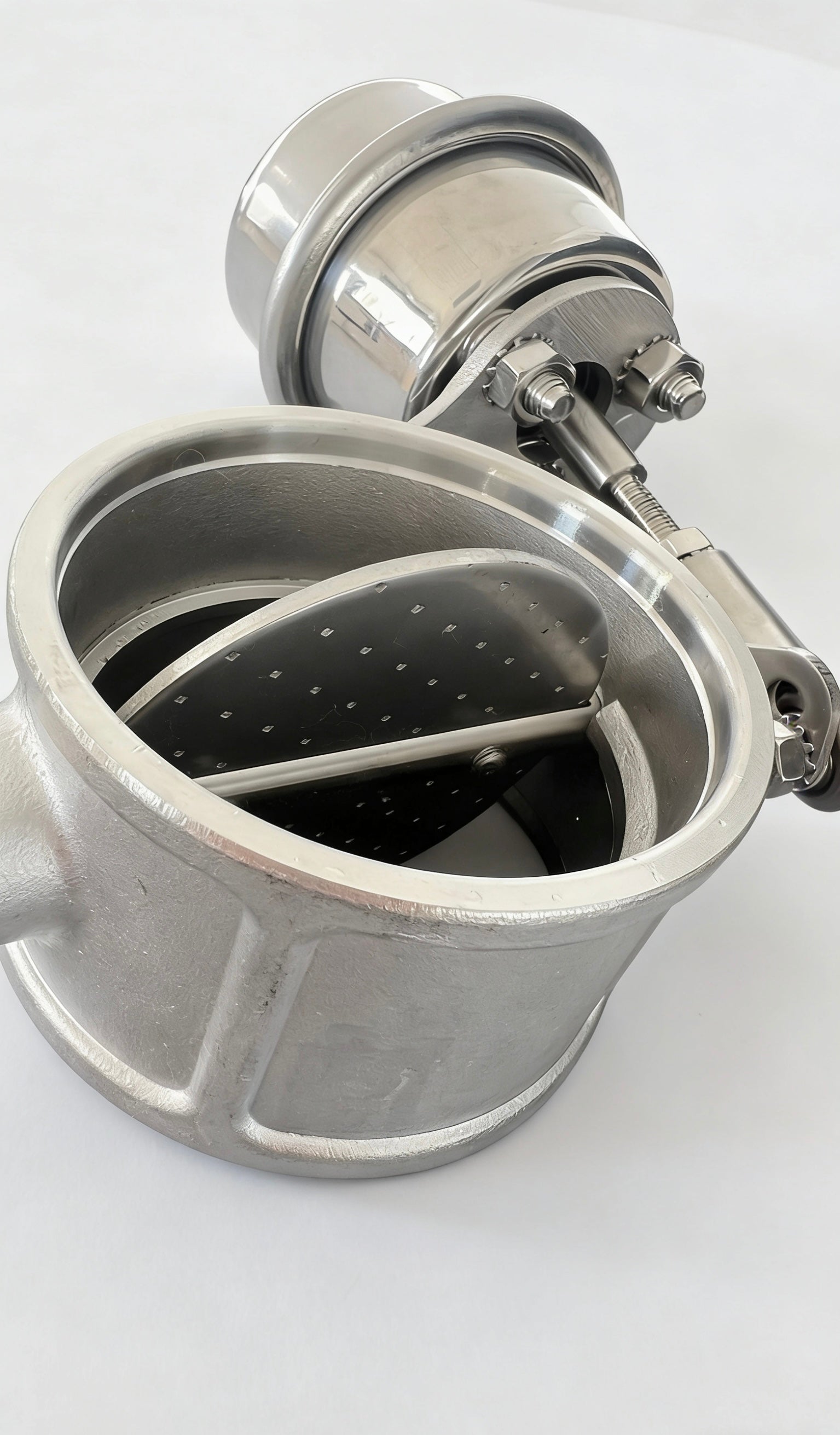 Close-up of stainless steel exhaust butterfly valve plate