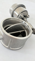 Close-up of stainless steel exhaust butterfly valve plate